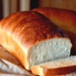 Loaf of homemade Amish White Bread fresh out of the oven