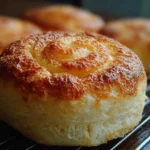 Classic Ensaymada - a soft and sweet Filipino pastry topped with cheese and butter
