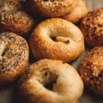 Homemade bagels fresh out of the oven, golden brown and delicious.