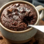 1-Minute Keto Brownie in a Mug topped with chocolate chips