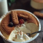 Slices of 2-ingredient Japanese cheesecake on a plate with fresh berries
