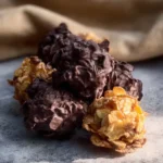 Delicious homemade Chocolate Cornflake Balls on a plate ready to enjoy