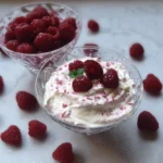Bowl of easy Greek yogurt jello fluff topped with fruit