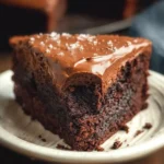 Flourless sweet potato chocolate cake topped with rich chocolate ganache.