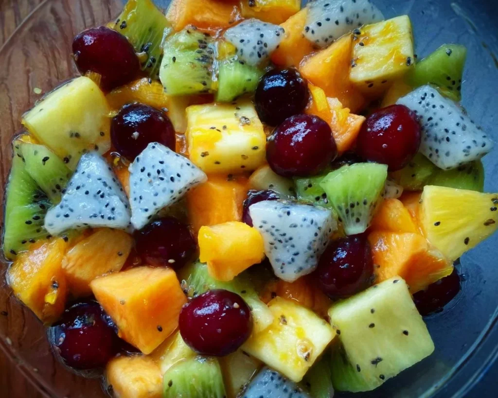 Colorful fruit salad with a variety of fresh fruits in a bowl