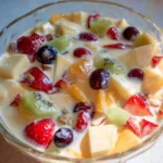 Delicious fruit salad topped with creamy condensed milk