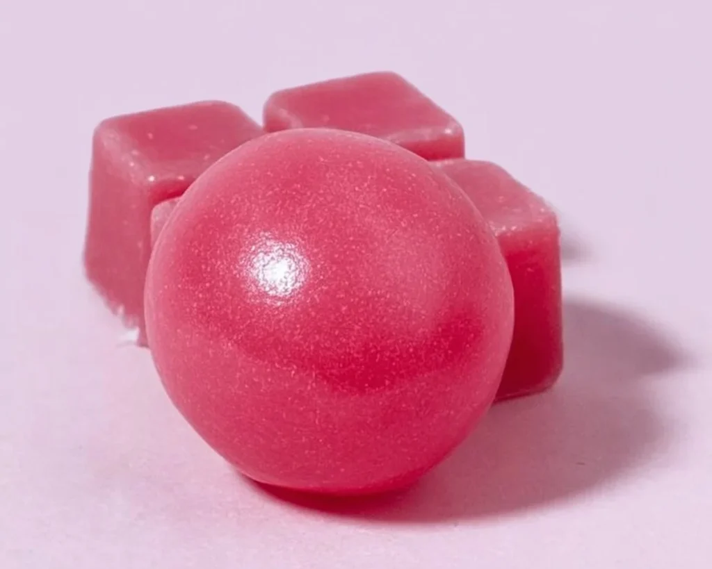 A colorful assortment of homemade bubble gum in various flavors and shapes