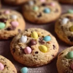 Delicious mini egg cookies with colorful candy eggs on top.