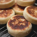 Homemade sourdough discard English muffins fresh from the oven.
