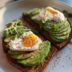 Delicious avocado toast topped with fresh ingredients and herbs