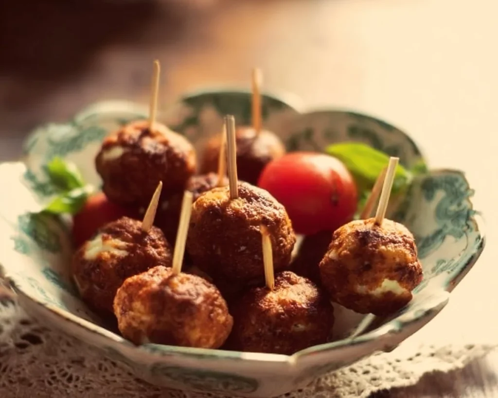 Delicious Caprese Skewers featuring mozzarella, tomatoes, and fresh basil on sticks.