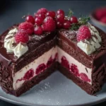 Chocolate and raspberry mousse cake slice on a plate
