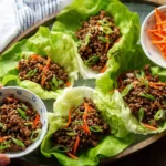 Low carb Korean beef lettuce wraps with tasty filling and fresh vegetables