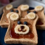 Creative bear toast breakfast idea with fun shapes and colorful toppings