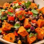 Roasted sweet potato black bean salad served in a bowl