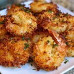 Crispy parmesan shrimp cooked in an air fryer, served for dinner.