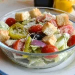 Delicious copy cat Olive Garden salad recipe with fresh ingredients and dressing