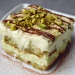 Delicious pistachio tiramisu dessert layered with creamy mascarpone and pistachios.