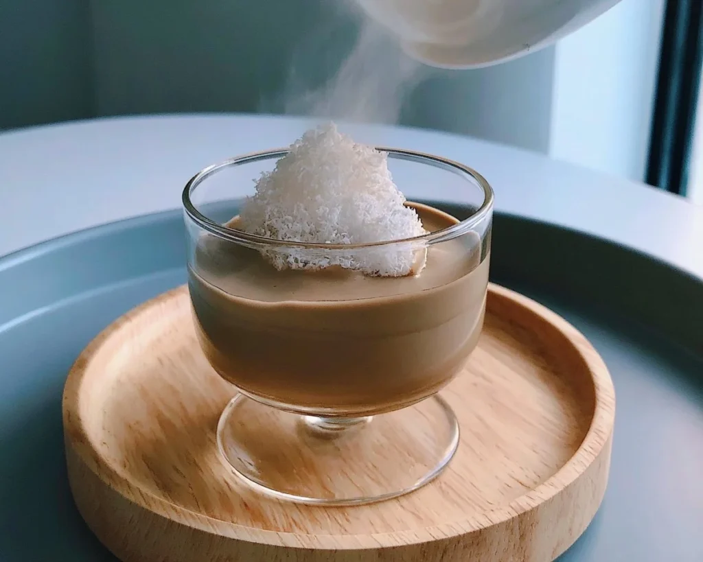 A refreshing Coconut Hojicha Cloud drink featuring roasted tea and creamy coconut.