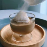 A refreshing Coconut Hojicha Cloud drink featuring roasted tea and creamy coconut.