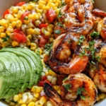 Easy grilled shrimp bowl with avocado and corn salsa