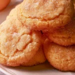 Delicious soft peach cookies on a white plate